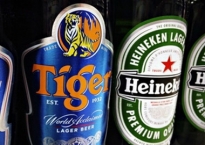 Chủ sở hữu bia Tiger dừng giao dịch vì vụ thâu tóm