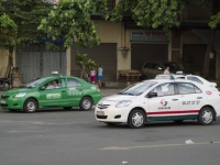 So kè lợi nhuận kinh doanh của 2 ông lớn taxi truyền thống một thời