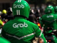 Grab lần đầu tiên có lãi sau 10 năm